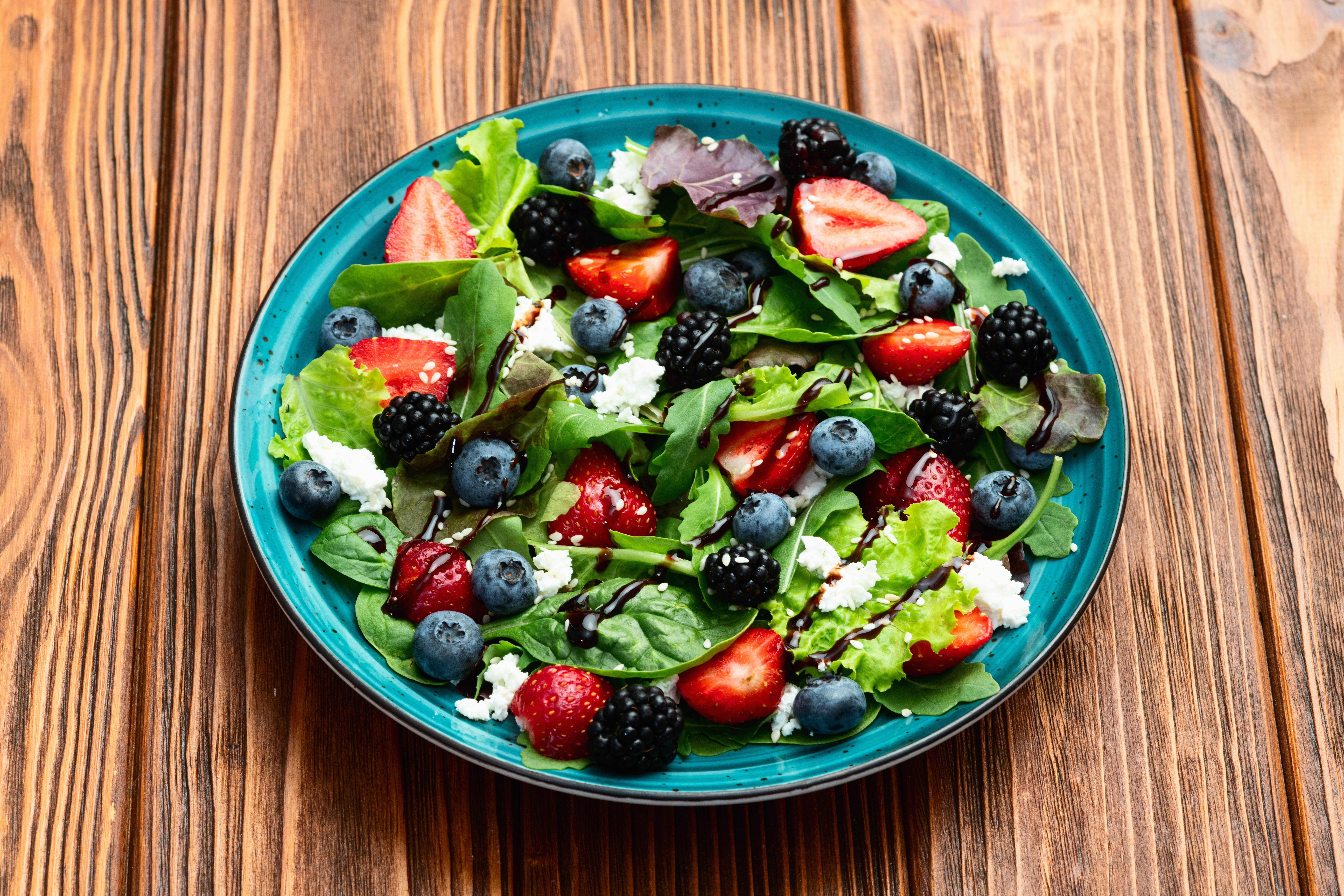 Salad of leafy greens with berries Salad of leafy greens with berries